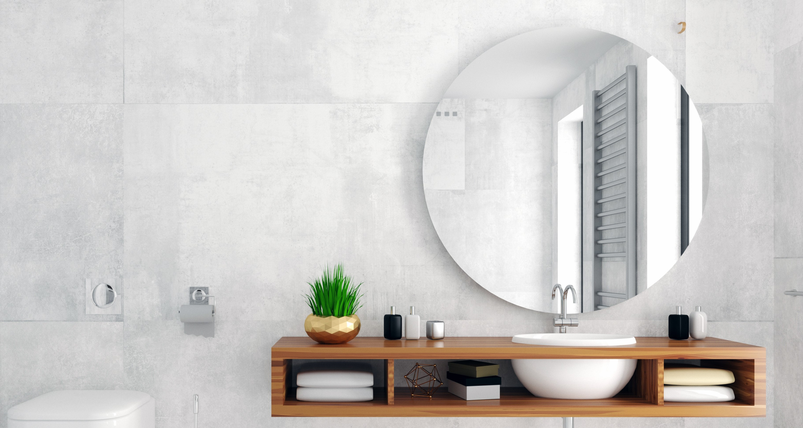 Elegant modern bathroom mirror in light grey tiled bathroom