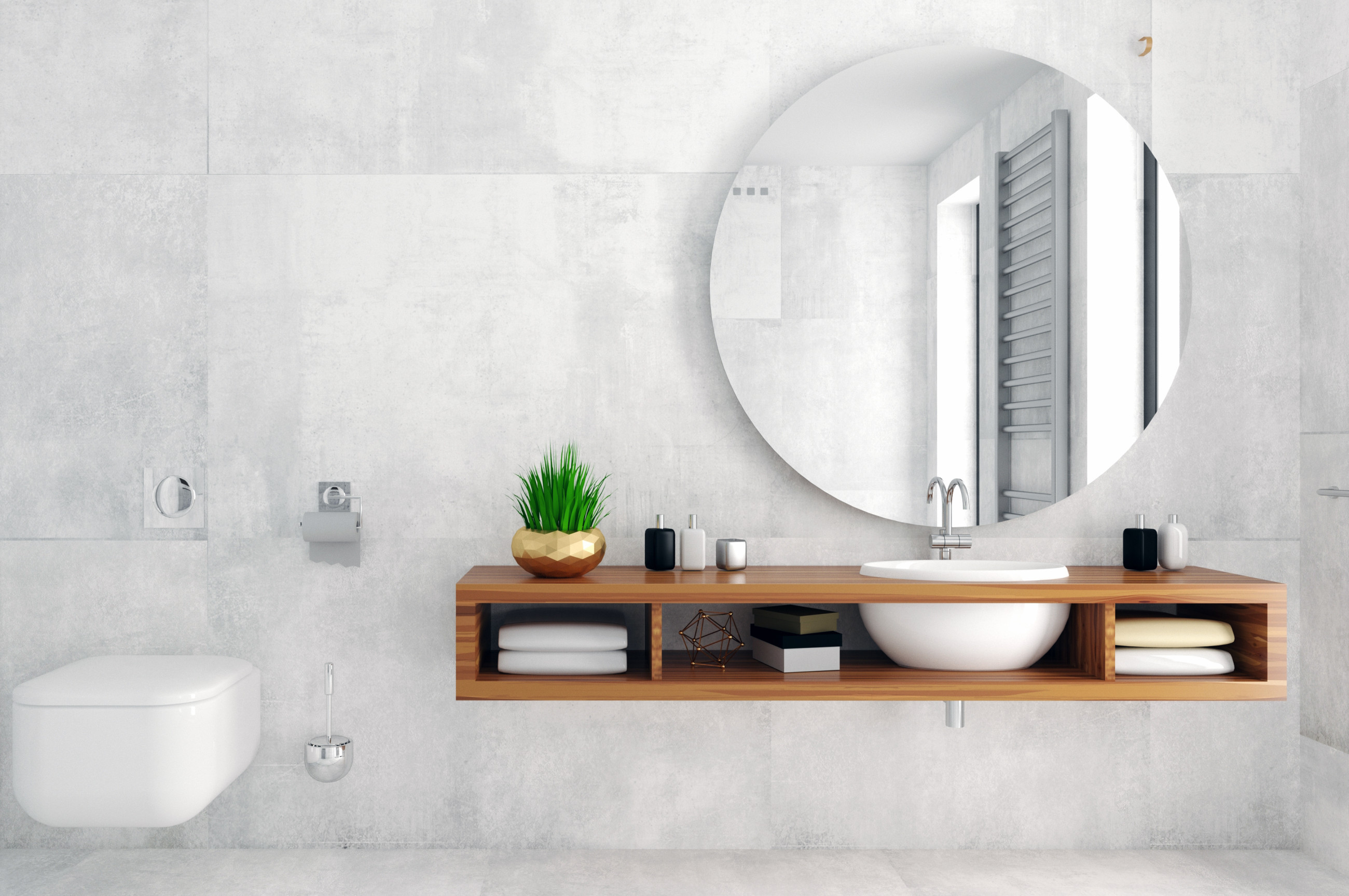 Elegant modern bathroom mirror in light grey tiled bathroom