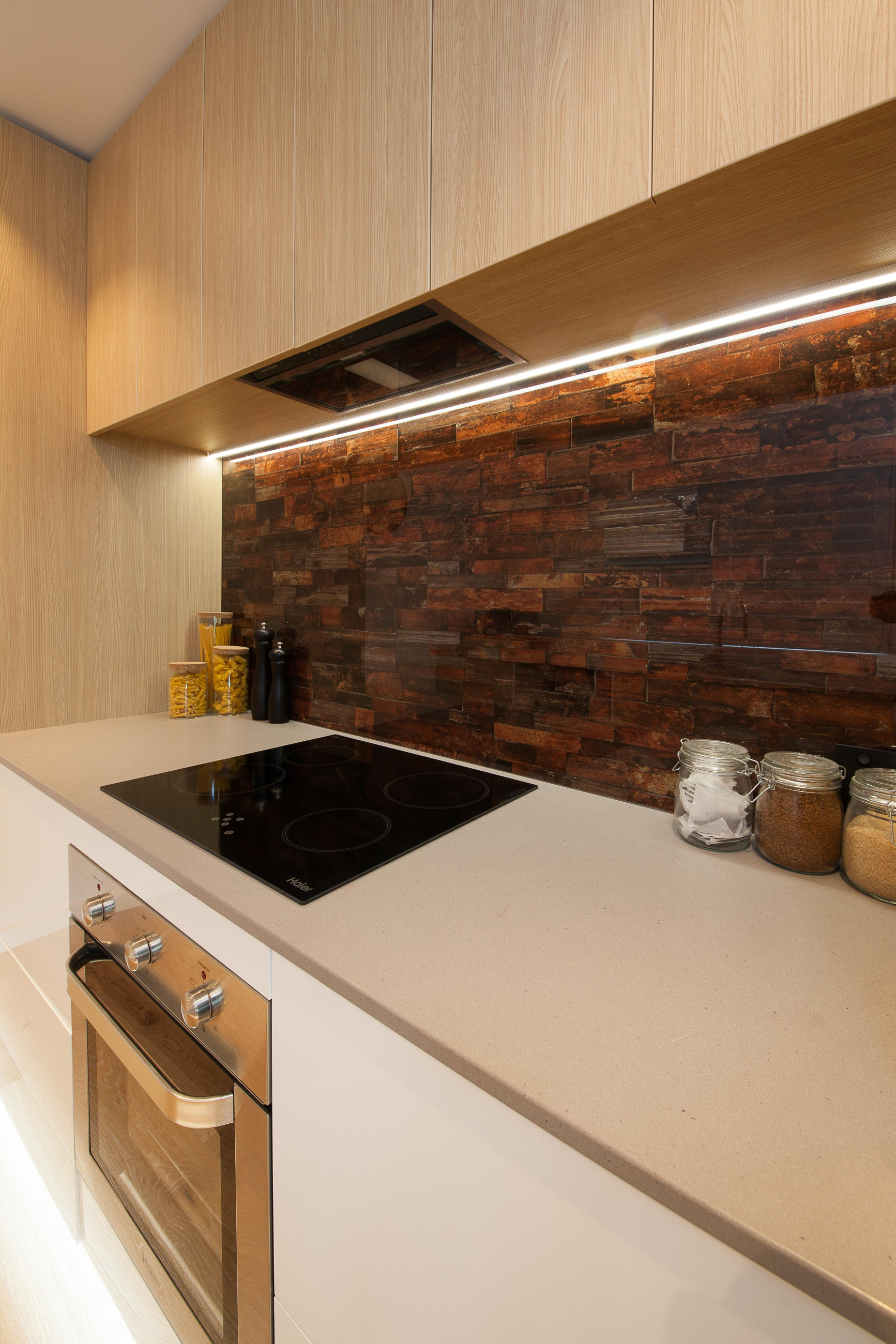 White kitchen with digital printed brick splash back