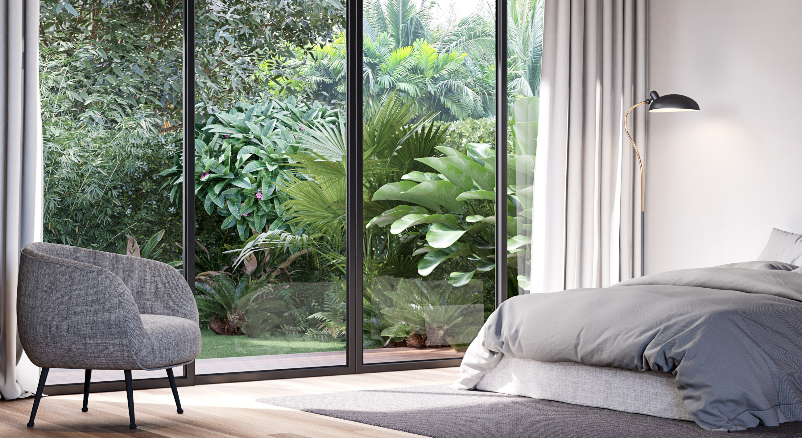 Modern grey bedroom with ceiling-to-floor windows overlooking lush bushland