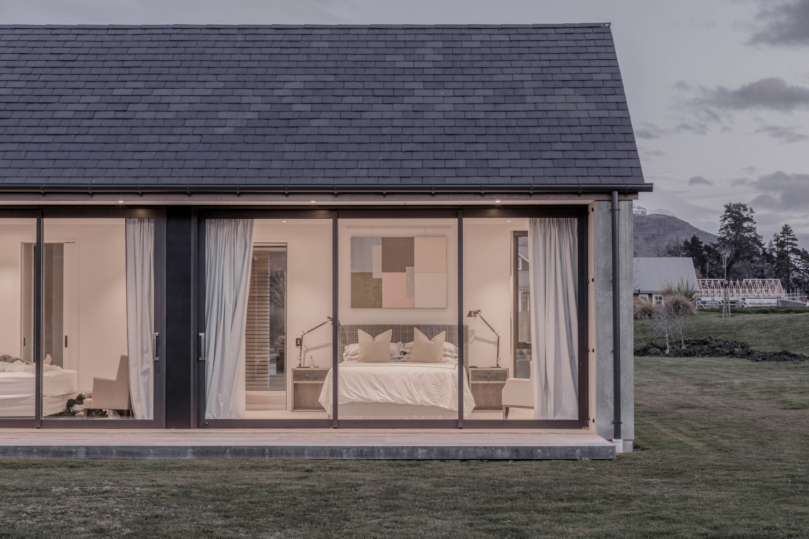 Sleek modern house with sliding glazed glass doors