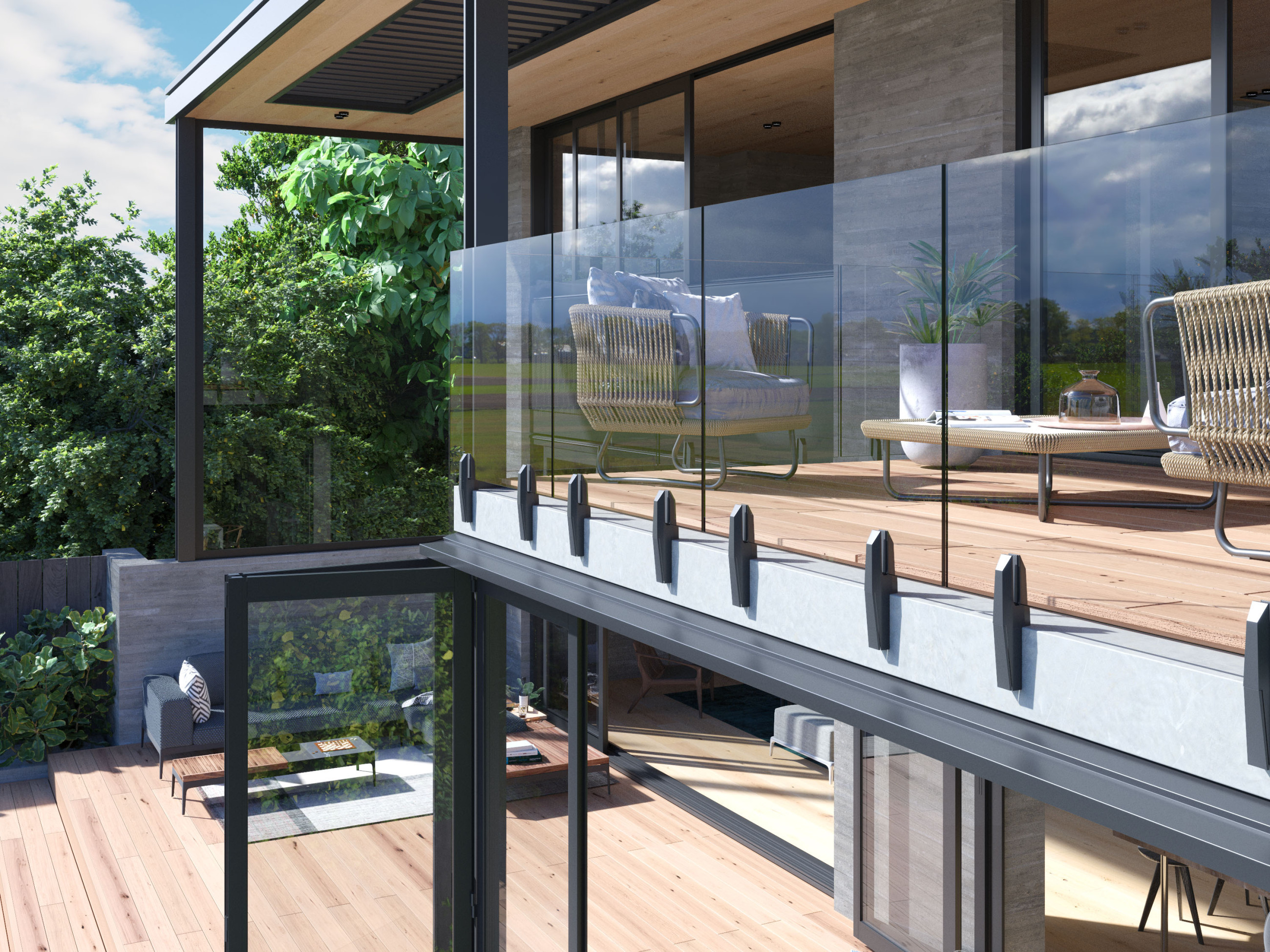 Stylish outdoor deck with a glass balustrade providing an unobstructed view of the serene landscape