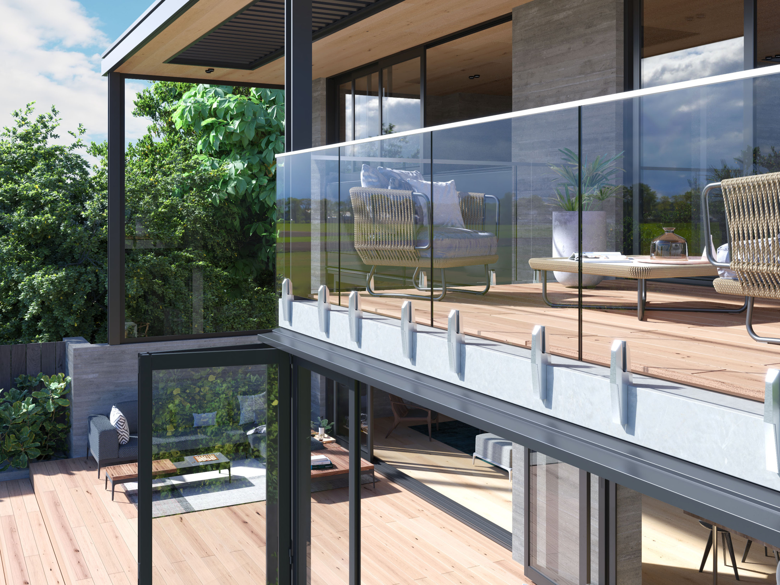 Stylish outdoor deck with a glass balustrade providing an unobstructed view of the serene landscape