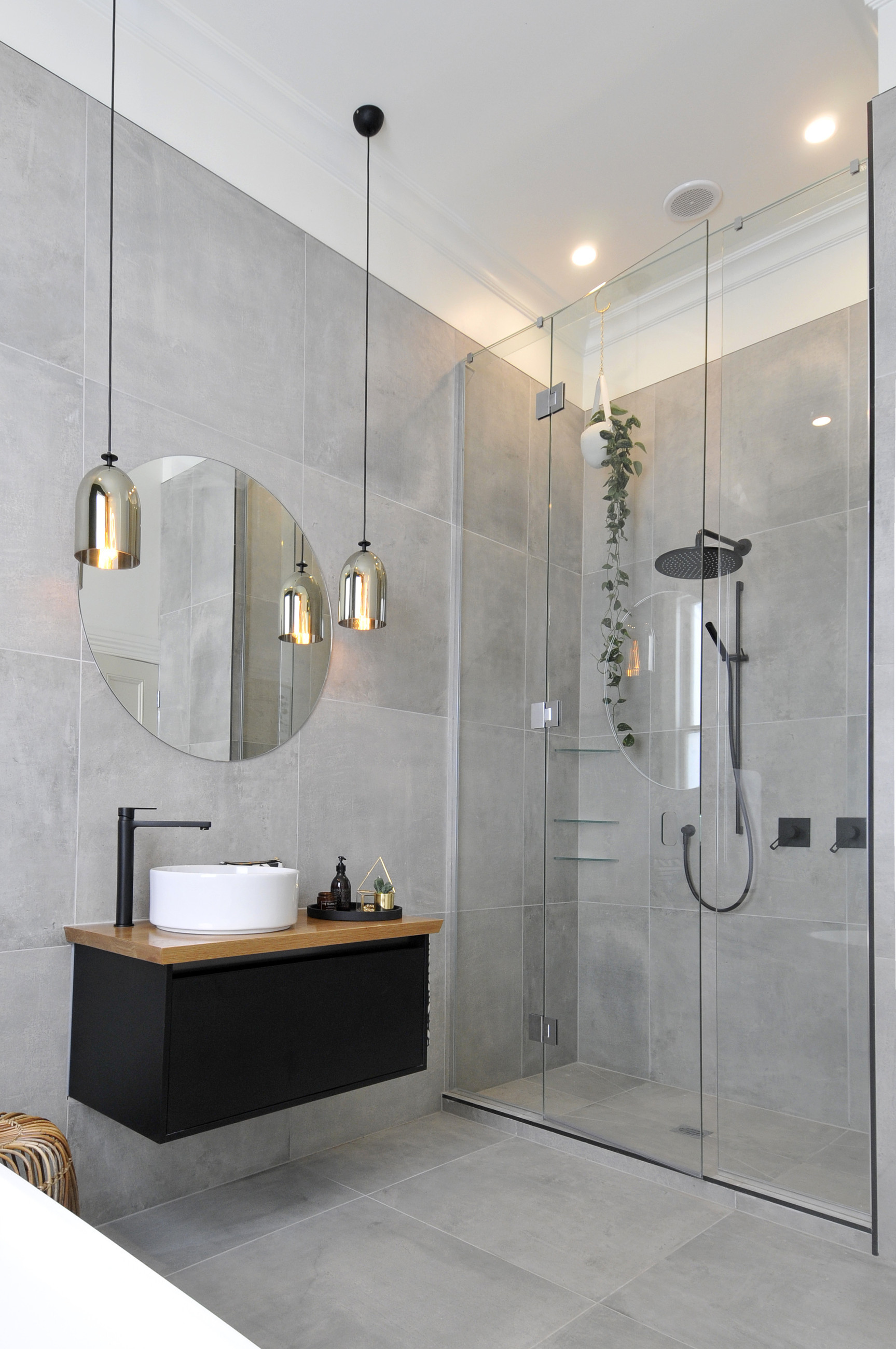 corner shower in bathroom with marble tiles