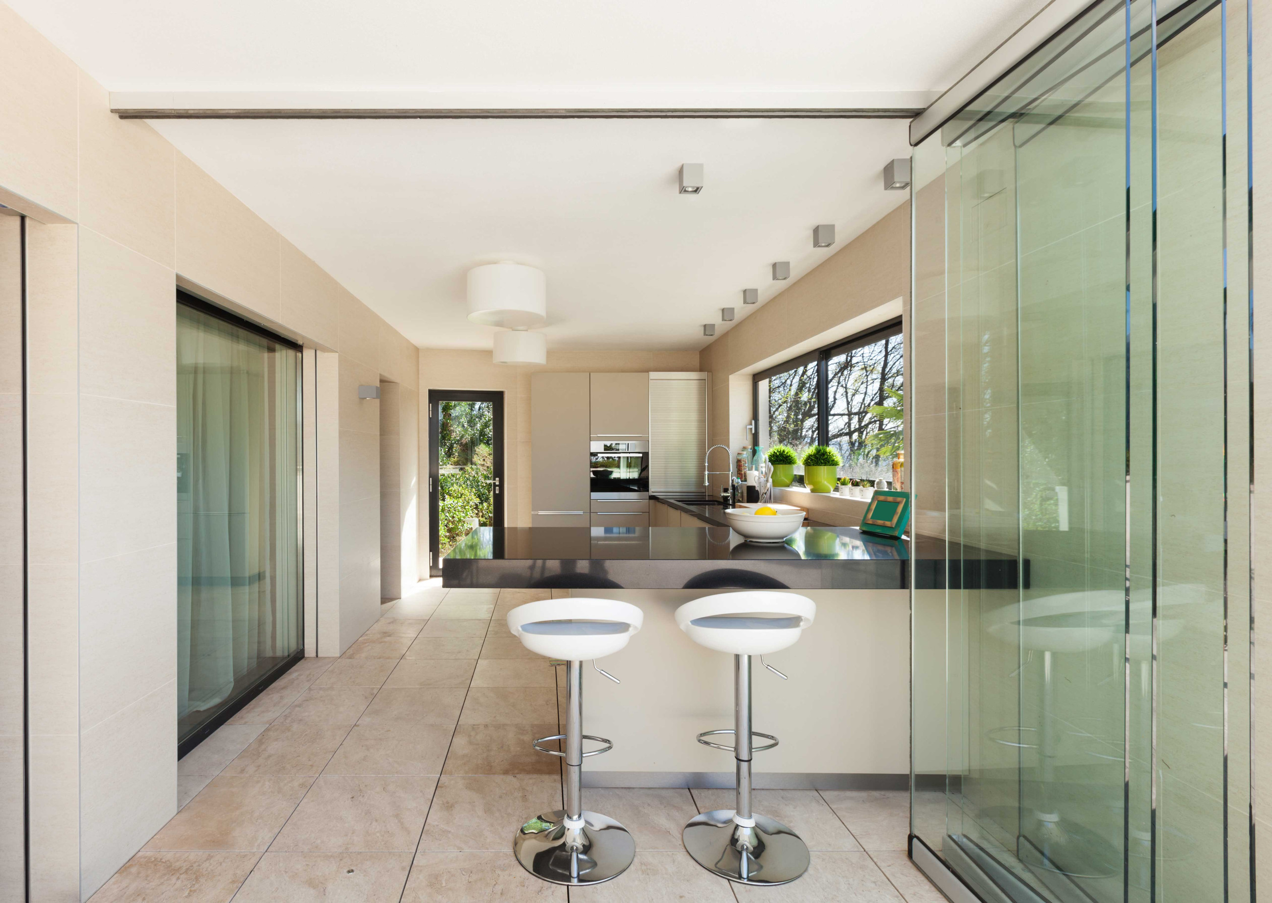Kitchen with tinted glass partition