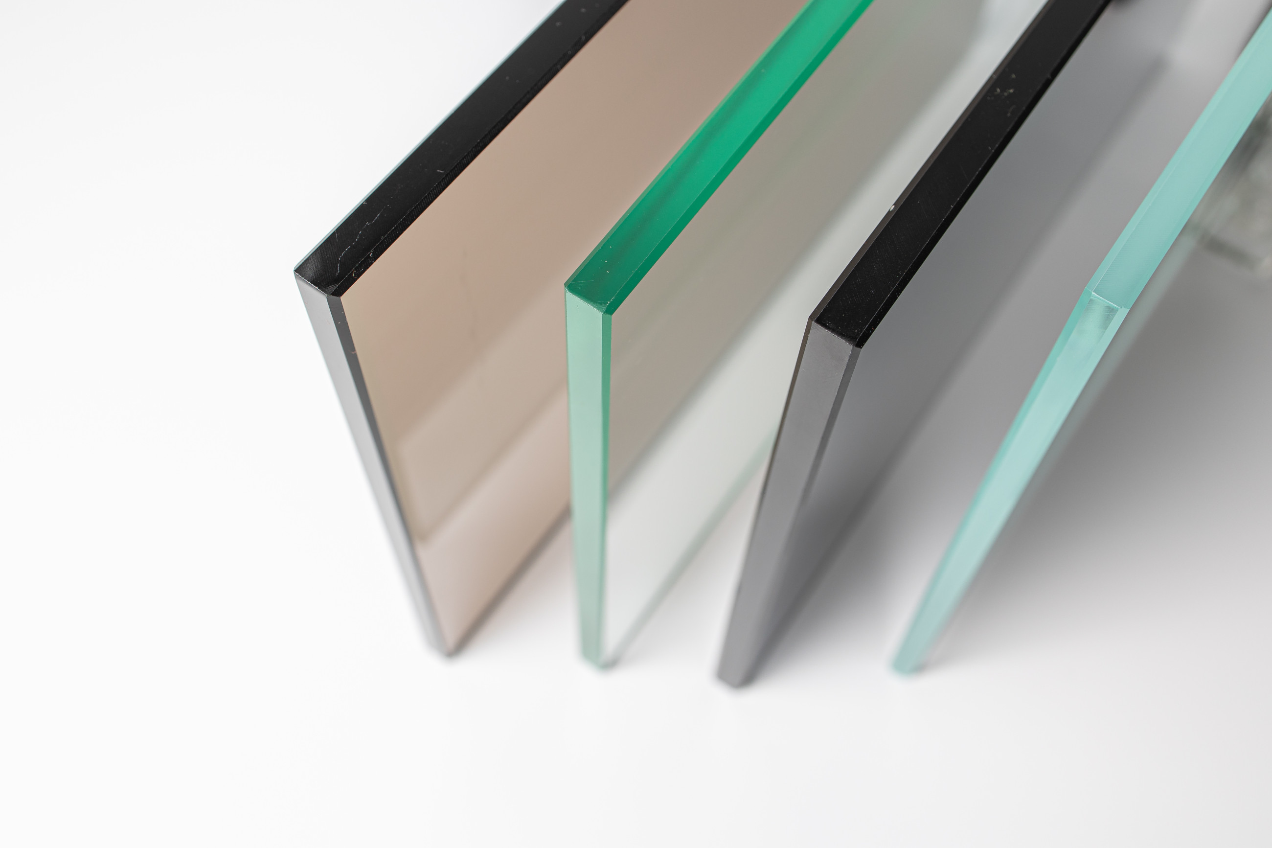 A stack of double glazed glass sheets with green edges