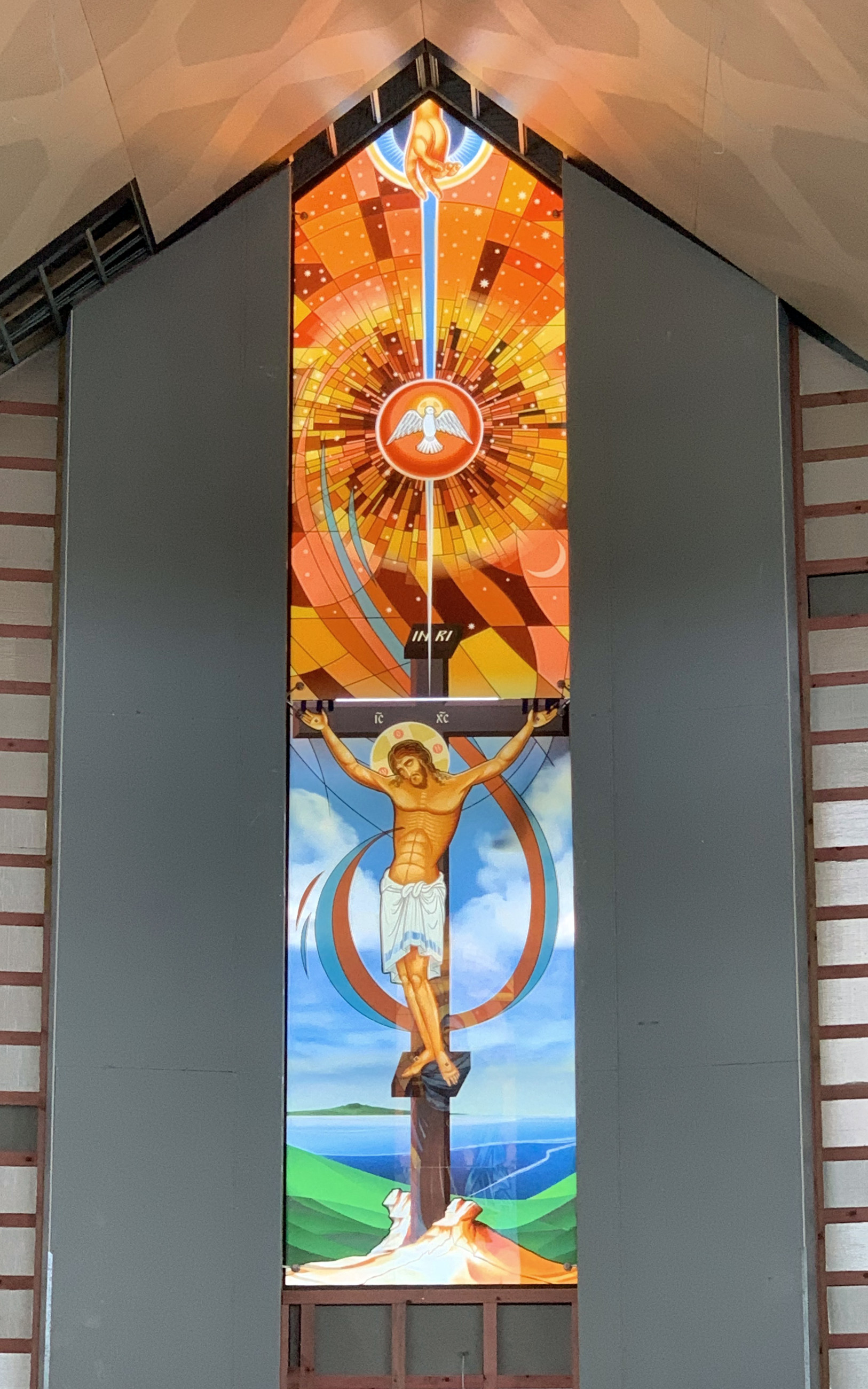 Colorful Jesus digital print window panels at St. Luke's Church