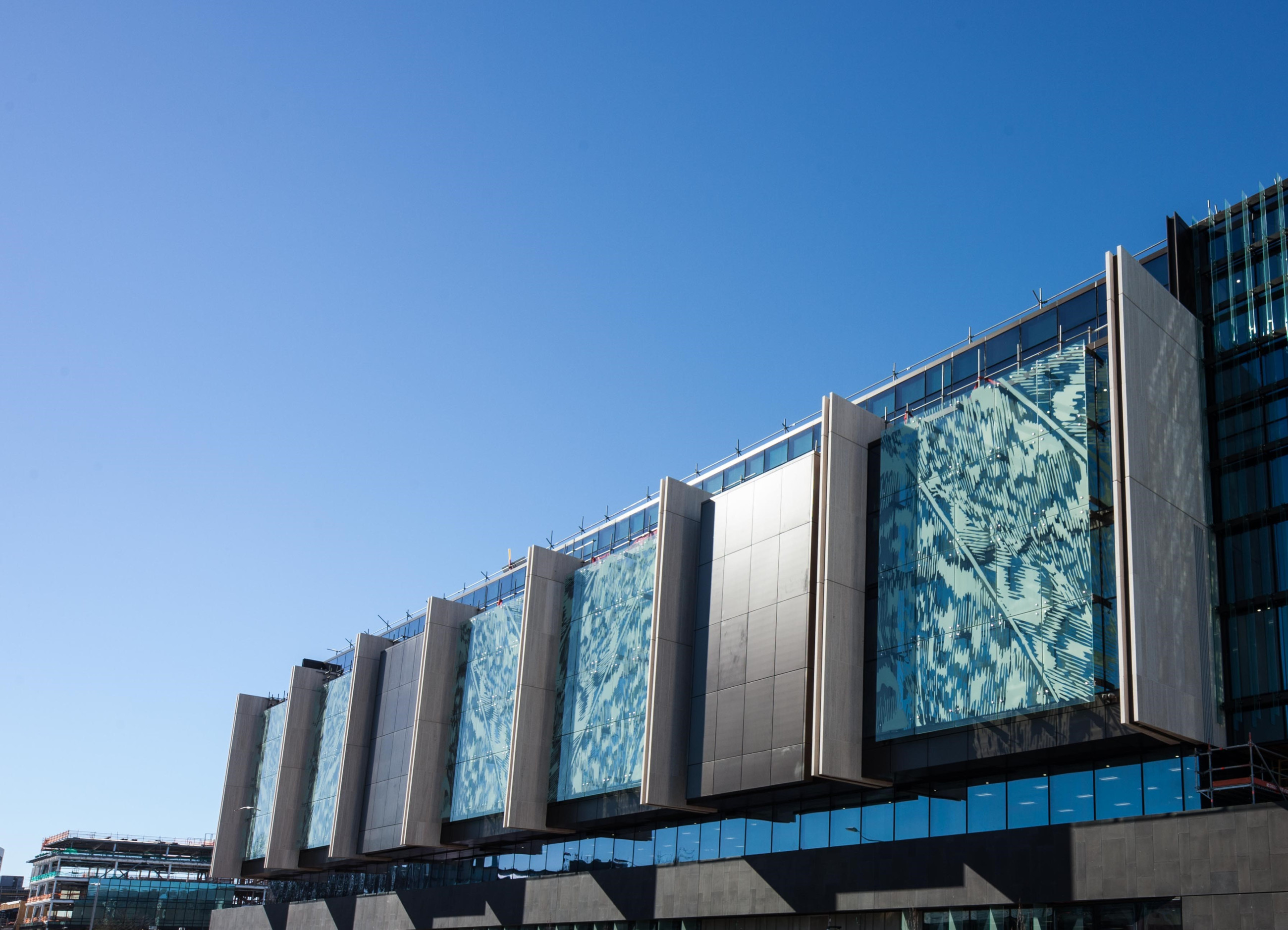 Glass panels with textured patterns for justice precinct