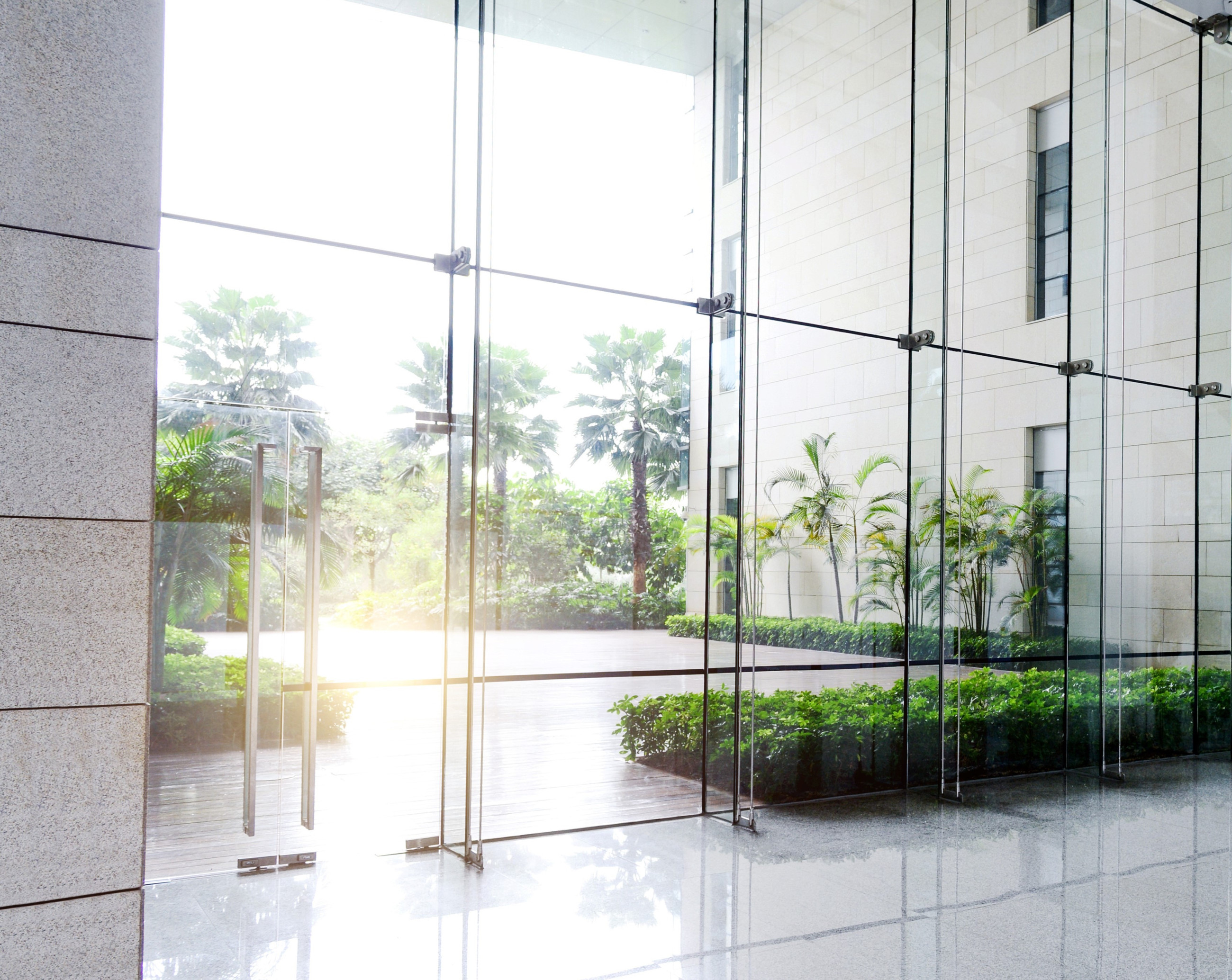 Floor-to-ceiling safety glass on commercial doors and windows