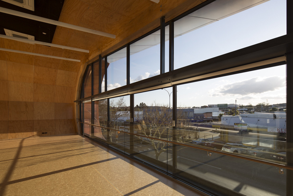 Interior of modern building with curved design and large glass windows