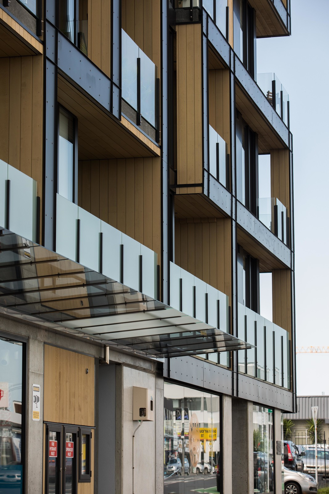 building with energy-efficient glass windows and transparent balustrades