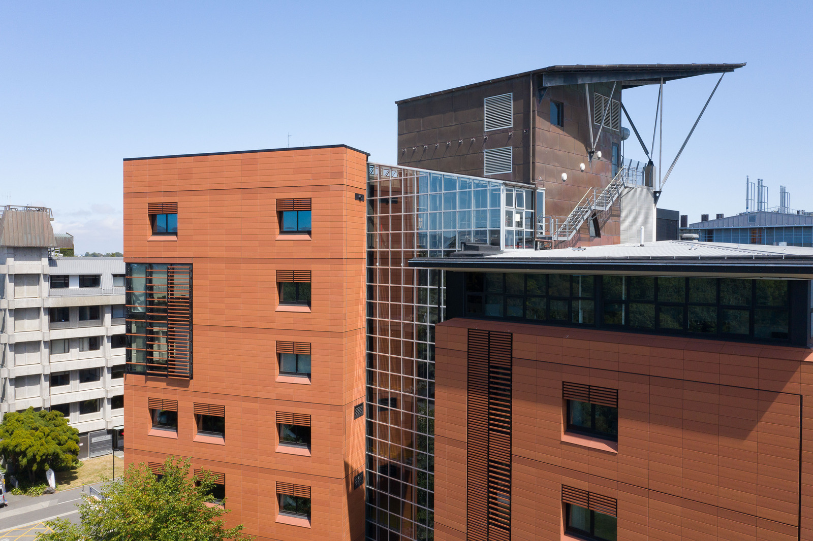 Contemporary architecture with an array of glass windows and brick exterior