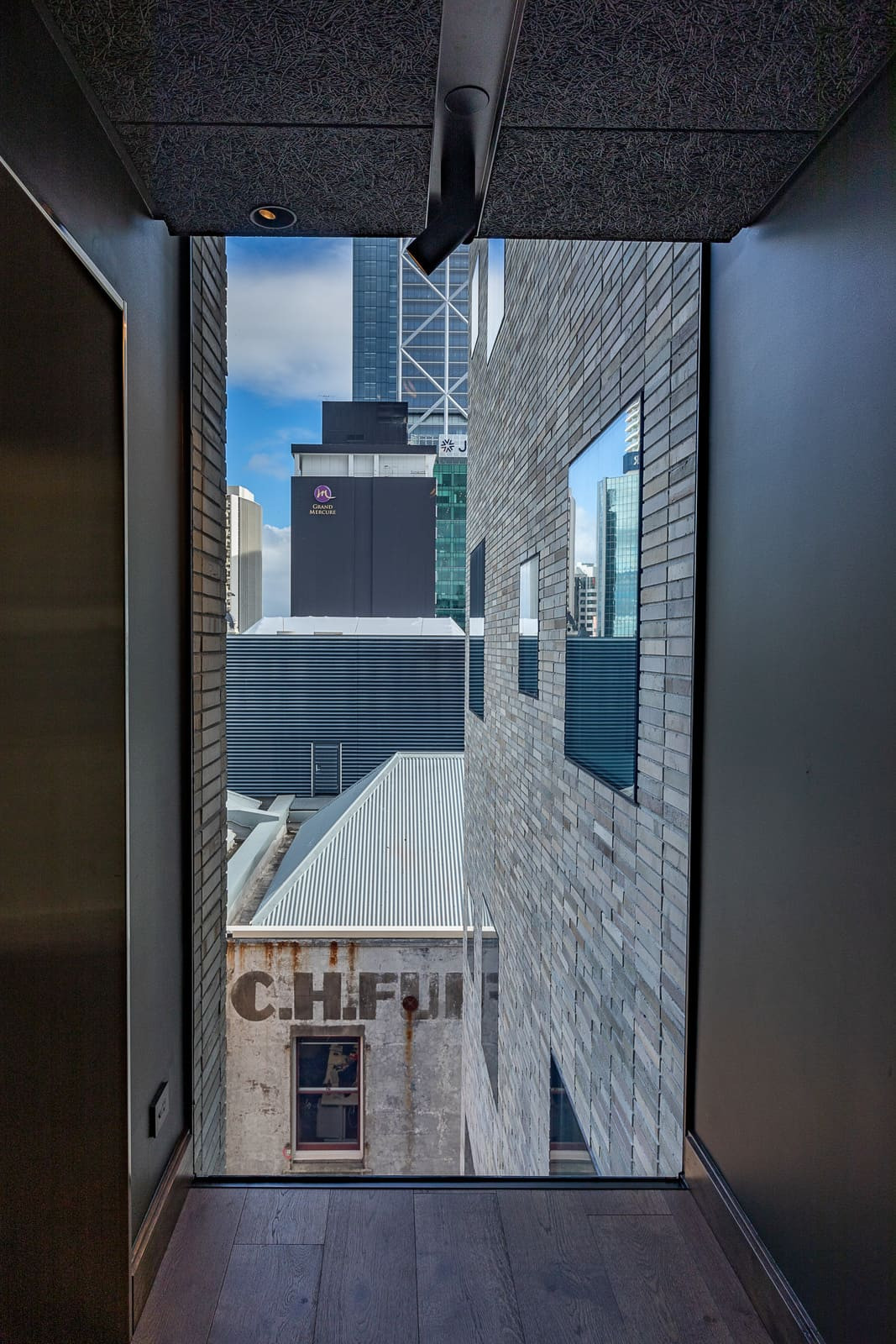 Britomart hotel: modern design with tall windows and brick exterior