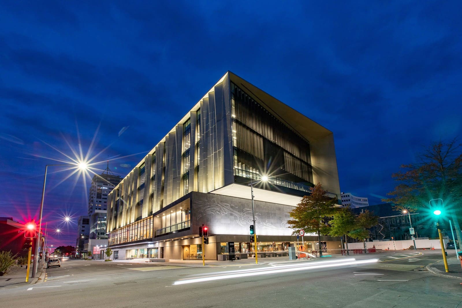 Sleek design and illuminated windows of library at night