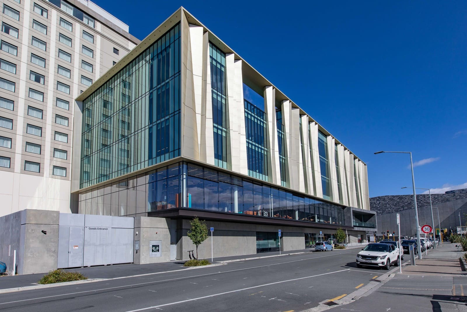 Modern library exterior with large windows and unique patterned facade