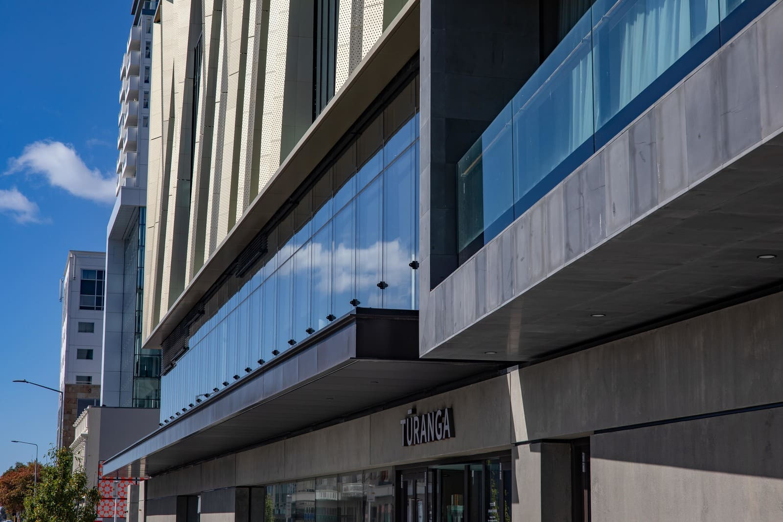 Urban library showcasing stylish architecture, including large windows and patterned exterior