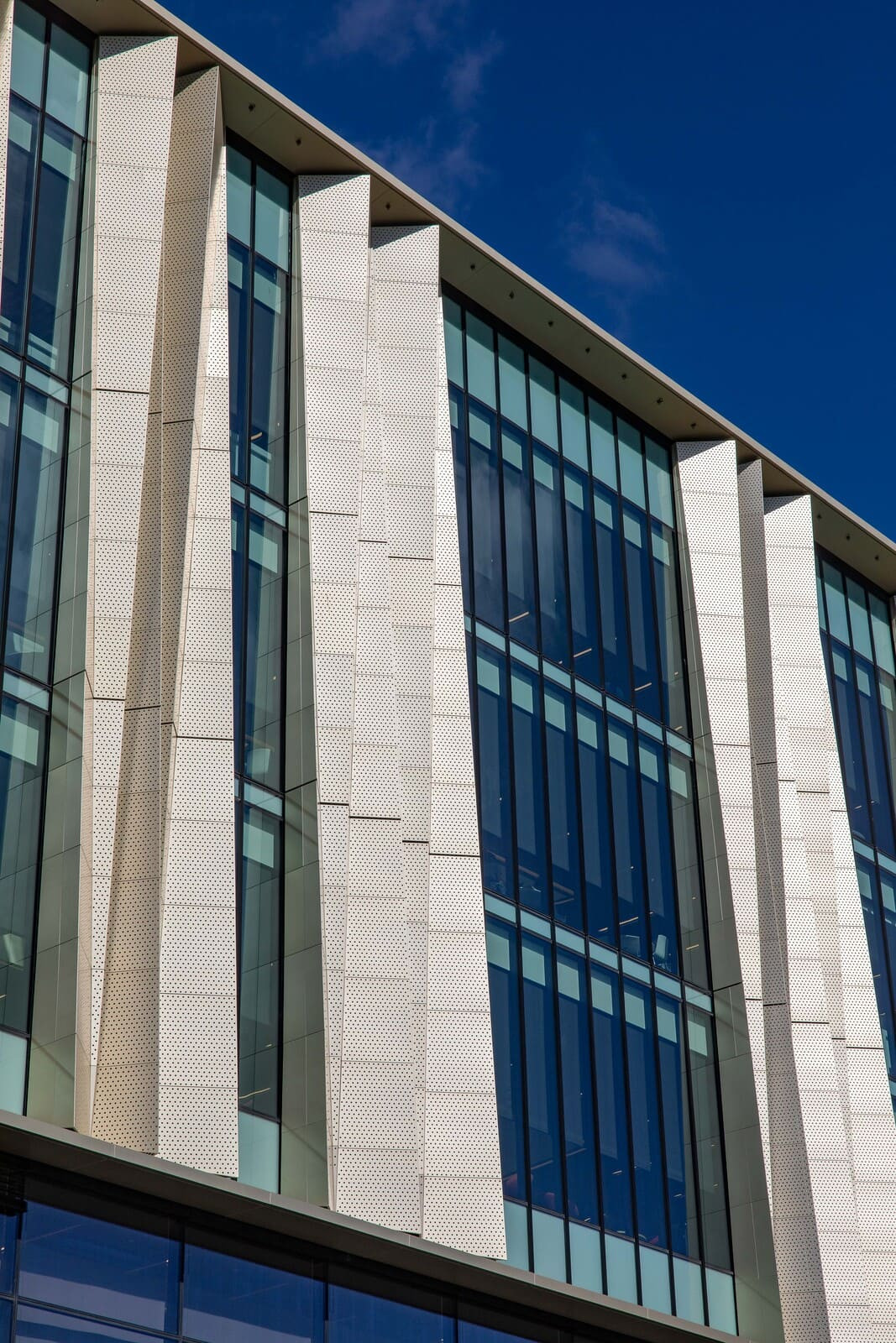 Library with contemporary look, highlighted by big windows and decorative facade