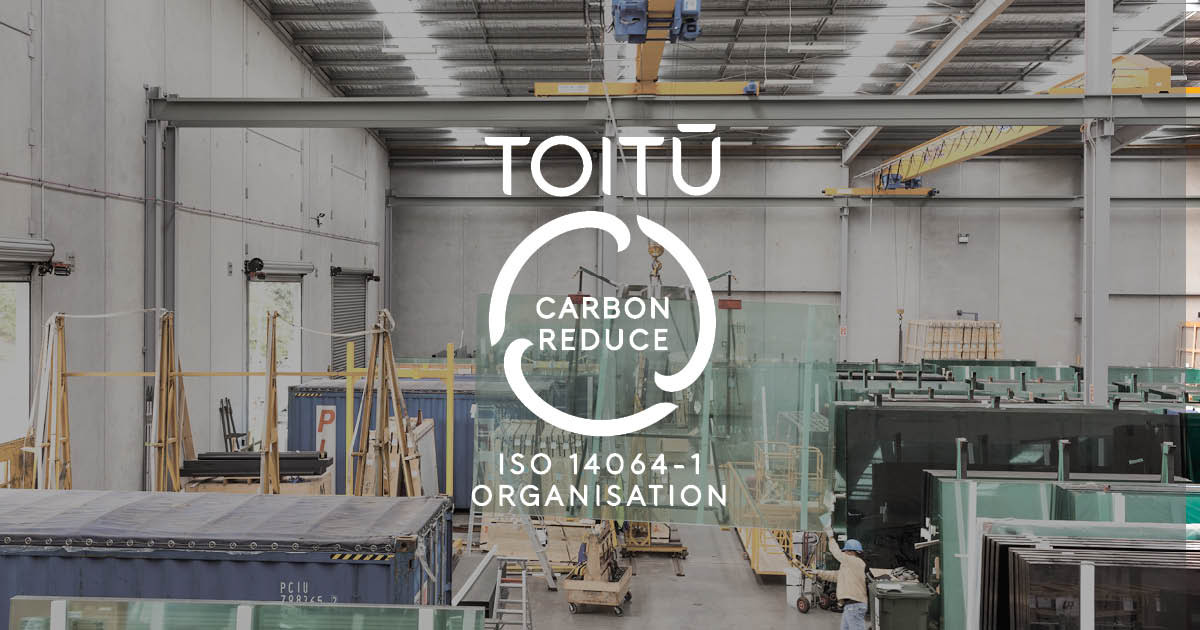 Glass workshop with toitu carbon reduce logo