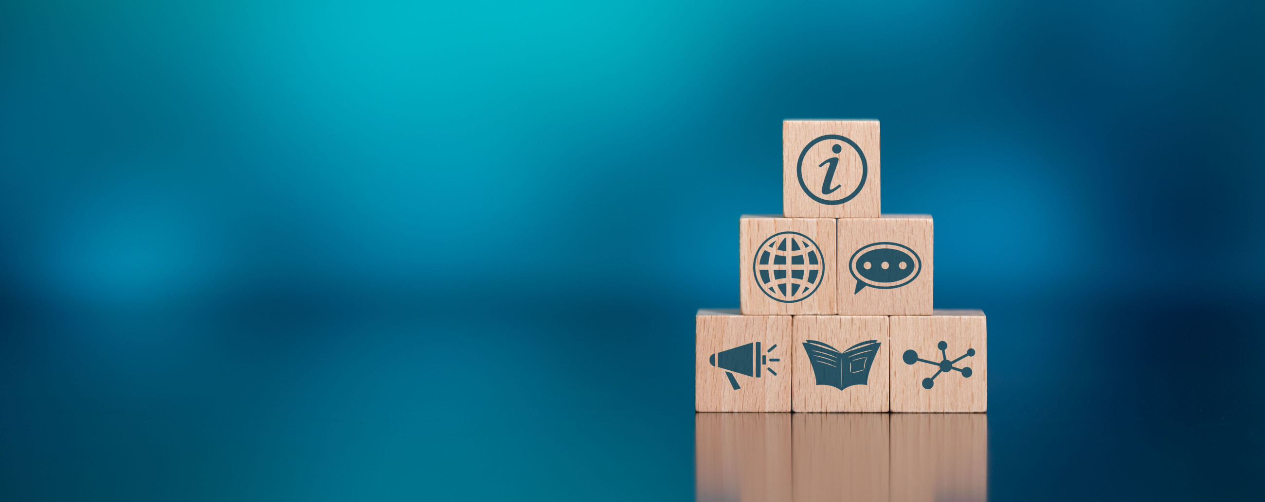 Wooden blocks with symbols on blue background