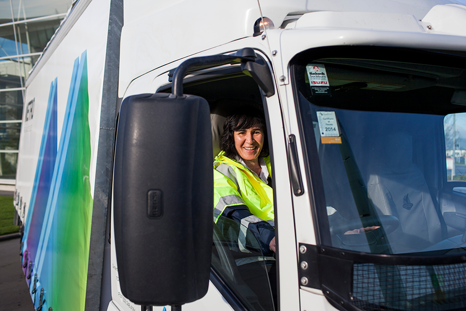 A women smiling in a Metro Glass truck